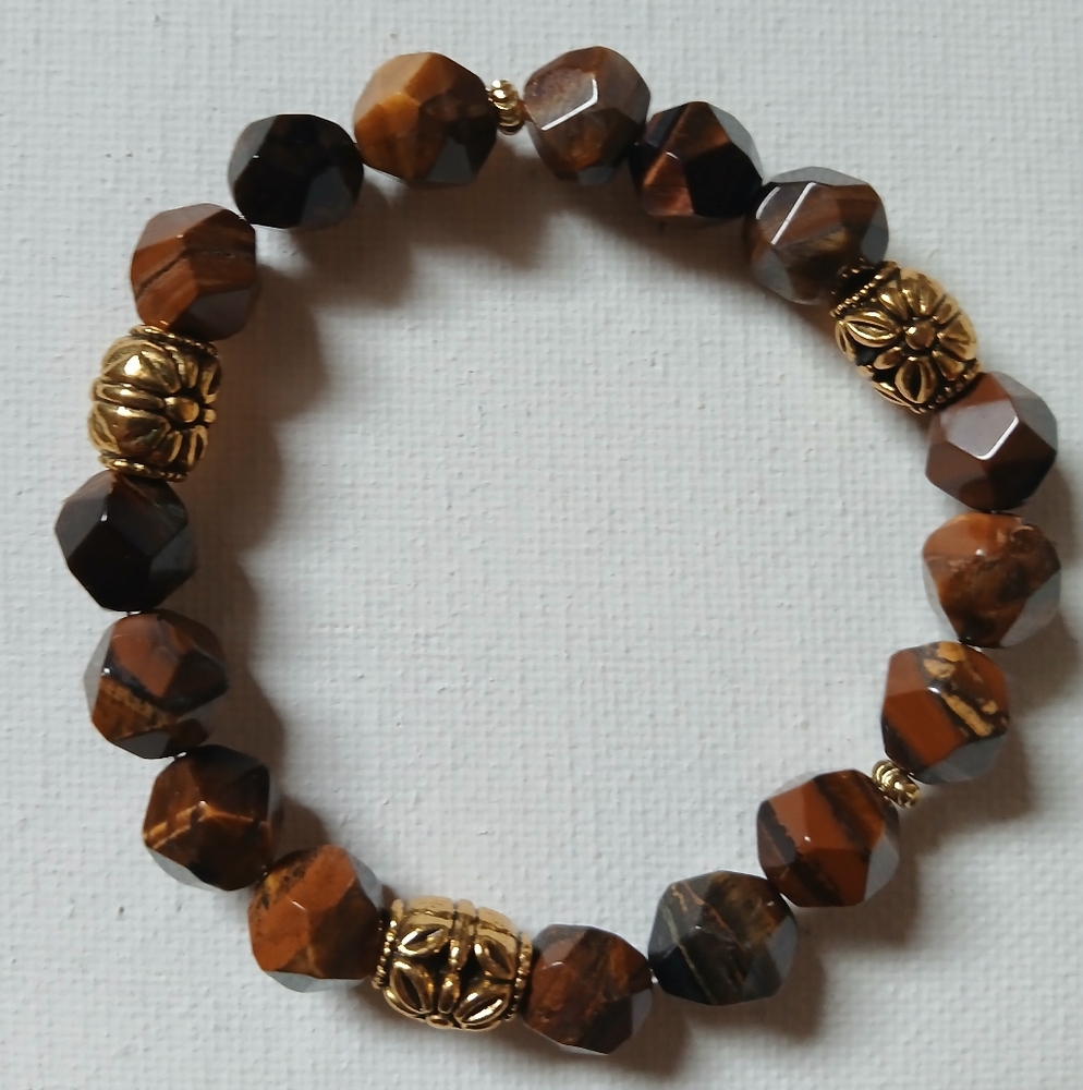 Natural tiger's eye stone with gold accents